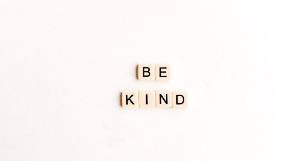 Scrabble letters spelling 'Be Kind' to promote kindness in Greenville and Spartanburg communities